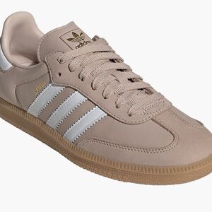Adidas Samba OG sneaker in Wonder Taupe with white stripes and a gum sole.